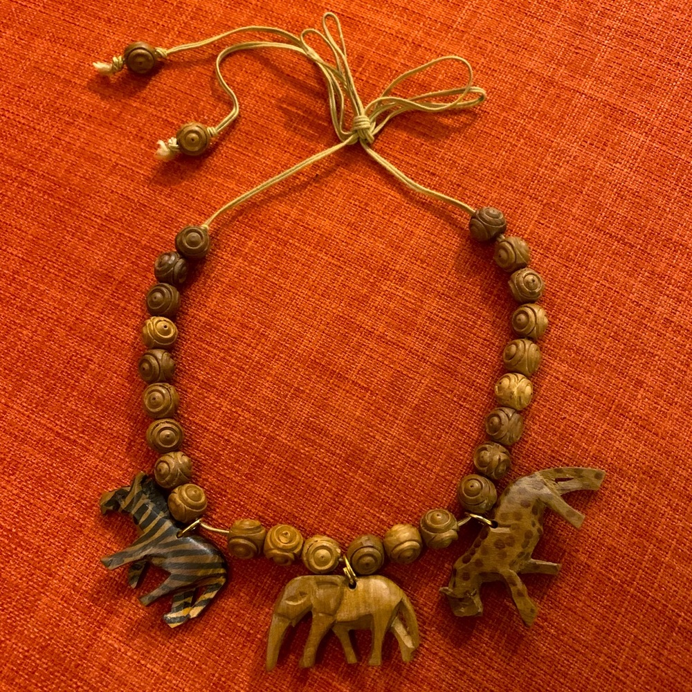 Carved wood animal motif necklace